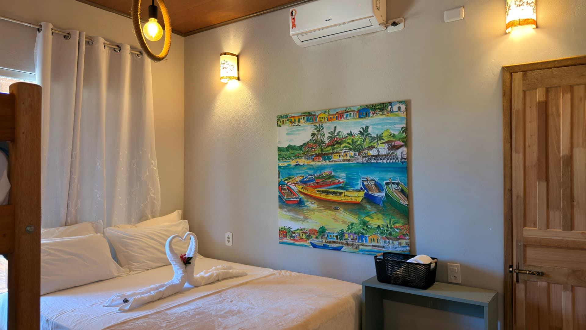 Quarto aconchegante com ar-condicionado